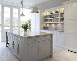 White or grey floors are good options for small kitchens with low ceilings. The Psychology Of Why Gray Kitchen Cabinets Are So Popular Luxury Home Remodeling Sebring Design Build