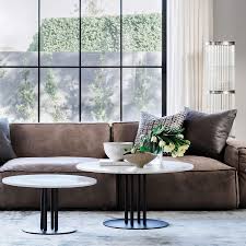 If you're styling a rounded coffee table and you want an easy, organized look, attempt dividing your table into thirds or quadrants. How To Style A Coffee Table All Shapes Explained Tlc Interiors