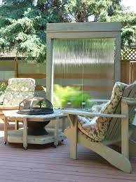 You'll enjoy the soft sound of trickling water as the flame burns brightly in the center of the bowl. 15 Patio Sized Fire Pits And Water Features Hgtv