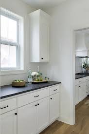 Benjamin Moore Oc 17 White Dove Kitchen Cabinet With Honed Black Granite And Black Hardware White Kitchen Decor Kitchen Remodel White Kitchen Cabinets