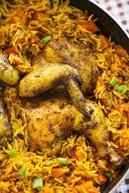 Jollof Rice With Chicken A Nigerian Chicken And Rice Recipe Munaty Cooking Best Chicken Recipes Jollof Rice Nigerian Recipes