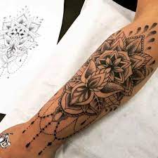 Tatouage bras nature tatouage fleur de lys tatouage mandala femme idée tatouage avant bras dessin tatouage femme tatouage hanche tatouage dentelle le tatouage mandala trouve ses origines dans différentes cultures spirituelles asiatiques, pour lesquelles il représente bien plus qu'un. Tatouage Fleur De Lotus Et Tatouage Fleur De Lys Toutes Nos Inspirations Henna Inspired Tattoos Lace Sleeve Tattoos Body Art Tattoos