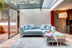 Blue Sofa Floor To Ceiling Windows Garden Glass Ceiling L Shape Sofa Powder Blue Blue Couch Living Room Blue Furniture Living Room Light Blue Sofa Living Room