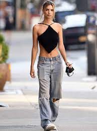 Pairing it with a matching skirt, emily ratajkowski puts an influence on the silhouette. Emily Ratajkowski In Ripped Oversized Dad Jeans Denimology