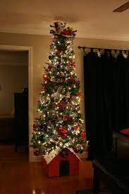 I Was Thinking Of What Kind Of Tree I Wanted This Xmas And Found This So Cute Snoo Snoopy Christmas Tree Peanuts Christmas Tree Charlie Brown Christmas Tree