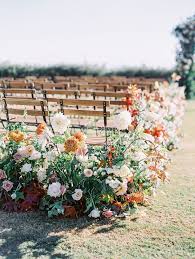 Aisle Flowers We Love Them Because They Are Unexpected In The Best Way Possible They Create A B Ceremony Flowers Aisle Wedding Ceremony Flowers Aisle Flowers