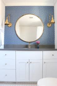 Large round gold bathroom mirror. Blue And Gold Bathroom Design Contemporary Bathroom