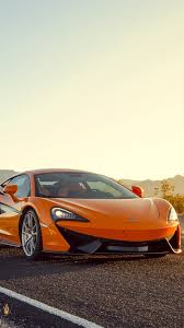 Maybe you would like to learn more about one of these? Mclaren 570s Orange Supercar At Sunset 1080x1920 Iphone 8 7 6 6s Plus Wallpaper Background Picture Image