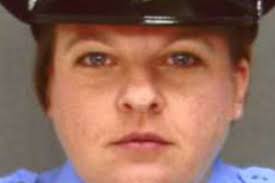 Michelle Winkis, 42, captain's aide in the 26th police district.