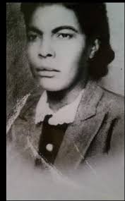 CANTON, MISSISSIPPI Early 1900s: Allie Graham Covington crossing Liberty  Street. (Source: Madison County Library System.)