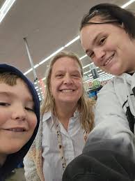 How can I find the woman who helped me at Walmart in Grand Junction?