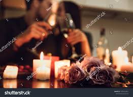 Beautiful Passionate Couple Having A Romantic Candlelight Dinner At Home Drinking Wine T Romantic Candlelight Romantic Candle Light Dinner Passionate Couples
