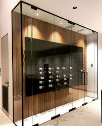 Painted wine sentinel doors this beautiful wine sentinel custom wooden wine cabinet had exterior unfinished premium redwood doors sent which were then primed and painted on site. Glass Enclosed Wine Cellars Stact Wine Racks