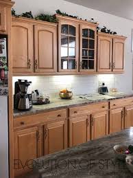 With the holidays just around the corner and the likelihood of entertaining in our home during this joyous time, i have been kind of pressuring mr. Mindful Gray Kitchen Cabinets Evolution Of Style
