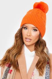 This bubble beanie hat knitting pattern is my new favorite fashion accessory! Orange Woven Knitted Bobble Hat In The Style