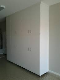 White Bright And Clean Garage Cabinets Custom Garage Cabinets Garage Storage Cabinets Garage Cabinets