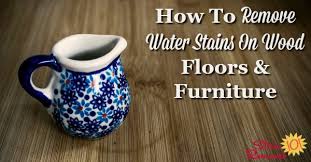 Dampen a clean cloth in the solution and wring out any extra liquid so that it is not dripping. How To Remove Water Stains On Wood Floors Furniture
