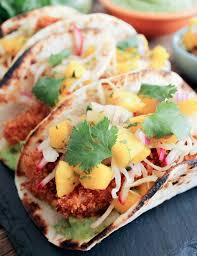 People talk about carne asada burrito, shrimp burrito and burrito enchilada style. Fish Tacos With Mango Salsa One Of The Iconic Baja California Dishes Is The Fish Taco Golden Brown White Fish Such Fish Tacos Mango Salsa Food Mango Salsa