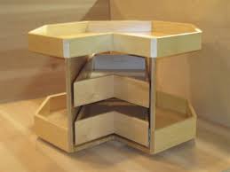 But other solutions exist for corner base cabinets: 2 Drawer Rotating Cookware Storage Module For Corner Cabinets Clear Finish Dovetailed Drawers Blum Undermount Slides Retro Fits In Minutes