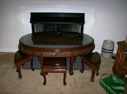 Set of four black lacquer asian stacking tables. Oriental Hand Carved Oval Coffee Table With 6 Stools Antique Appraisal Instappraisal