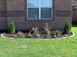 Large stone landscape edging for flowers another great way to use large stones is to round them up around a pack of vibrantly colored plants. Types Of Lawn Edging Homesteady