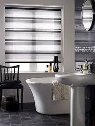 Discover the best small bathroom designs that will brighten up your space and make the whole your tiny bathroom just might become your new favorite room. Fabric Blinds Cleanses Roller Blinds Window Treatments Blackout Blinds Black Blackout Blinds Black Blinds Curtain Spaces Bathroom Blinds Blinds Roller Blinds