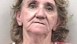 Woman charged in shooting death of guest