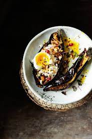 Roasted Aubergine With Tahini Dressing And Hazelnuts Serving Dumplings Recipe Recipes Tahini Dressing Salad With Sweet Potato