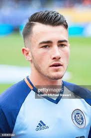 Midfielder Jack Harrison of New York City FC kicks the ball forward... News  Photo