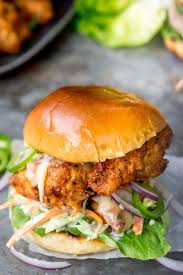Crispy Chicken Burger With Honey Mustard Coleslaw On A Toasted Brioche Bun With Jalapeno Crispy Chicken Burgers Fried Chicken Recipes Chicken Sandwich Recipes