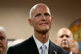Education records at odds in race between Rick Scott, Charlie Crist