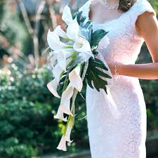Calla lilies bloom in white, dark. Pictures Of Calla Lily Bridal Bouquets Lovetoknow