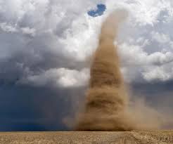 A tornado forms from a large thunderstorm. Stormchasing Amazing Stories Of Tornado Escapes