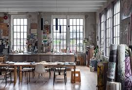 Unboxing and assembling arts and crafts table from artist's loft. Industrial Artist Loft Close From Lake Como