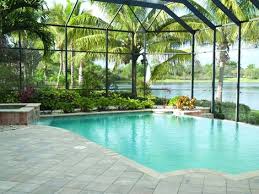 One homeowner has concrete and brick leading down to their pool from their back porch and patio. Our Guide To Your Perfect Pool Enclosure