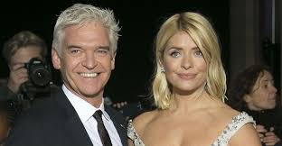 With eamonn holmes and ruth langsford holding the fort back home during the half. Holly Willoughby Swears After Losing Husband Dan Baldwin