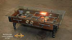 Steampunk industrial barnwood coffee table / machine age lamps / steam gauge / boiler door / table #2533. Steampunk Industrial Table Coffee Barn Wood Gauges Glass Table 1750 Industrial Design Furniture Industrial Furniture Vintage Industrial Furniture