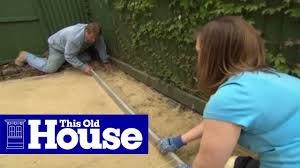Excavate the area within the stakes to a depth of 8 inches. How To Build A Brick Patio This Old House Youtube