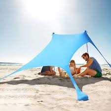 Using a sun umbrella or other types of physical barriers to create shade intuitively seems like an effective way to protect ourselves from the sun. Buy Kmm Beach Tent Sun Shade 7 7 Ft Family Beach Canopy With Upf50 Uv Protection Pop Up Sun Shelter For Beach Fishing Backyard Camping And Outdoors Online In Indonesia B08sj5hzgx