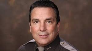 Benton sheriff charged with strangling wife, witness tampering