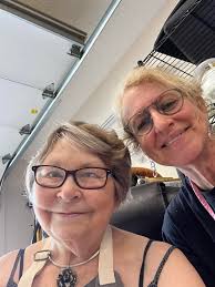 Our obligatory photo in front of our dear Elijah portrait. Anita Olsen  Harper and Barb Hill. Always good to be