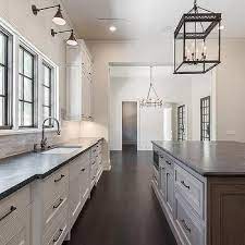 Country kitchen islands with dark and white wood Brown Kitchen Island With Black Leathered Granite Countertops Leathered Granite Countertops Replacing Kitchen Countertops Leathered Granite