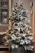 Blue Flocked Christmas Tree Decorated