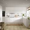 Sticking with a neutral backdrop (white cabinets, white kitchen cabinets, and a white backsplash) in the kitchen creates an easy setting for you to work in splashes of color when you are looking for a spicy alternative to a clean white look. 1