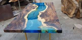 Senna Siamea Wood A Rare Type Of Wood From Vietnam Legs Are Made Of Metal Coated With Mat Black Colour It Is On Epoxy Wood Table Resin Table Diy Resin Table