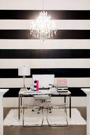 The black and white color motif is a really. The Black And White Striped Wall The Reveal The Tomkat Studio Blog White Home Decor Striped Wall White Decor