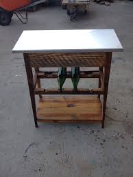 Custom Built Wine Rack With Steel Top And Reclaimed Wood Base By Landrum Tables Http Www Landrumtables Com Built In Wine Rack Custom Furniture Build A Table