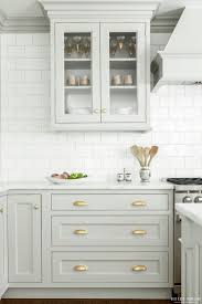 Make your family's favorite room feel new and improved with these cabinet organizing hacks. Look We Love Gray Kitchen Cabinets With Brass Hardware Kitchen Inspiration Kitchen Cabinet Design Kitchen Inspirations Kitchen Cabinets Makeover