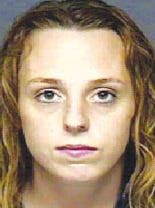 Woman accused of using broken spoon to cut boyfriend