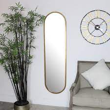 The frame has oak leaf and acorn motif. Large Gold Oval Mirror 42cm X 156cm